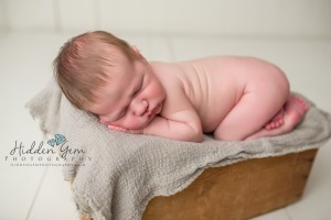 baby in wood box, newborn photographer