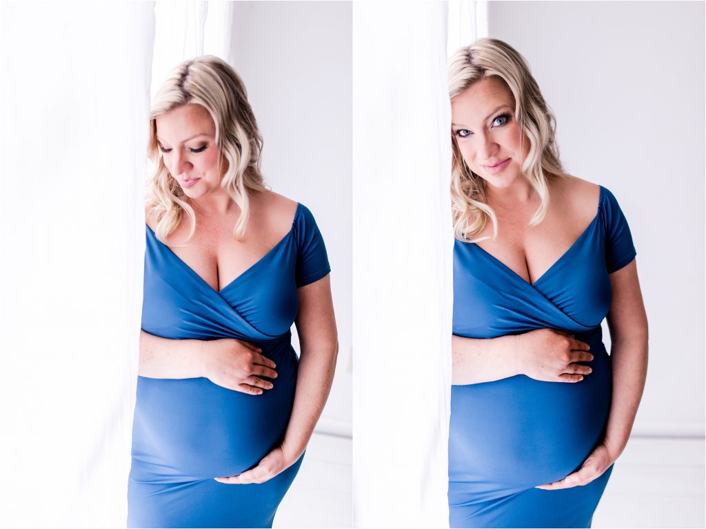 Pregnant mom in studio maternity session wearing blue gown that matches eyes